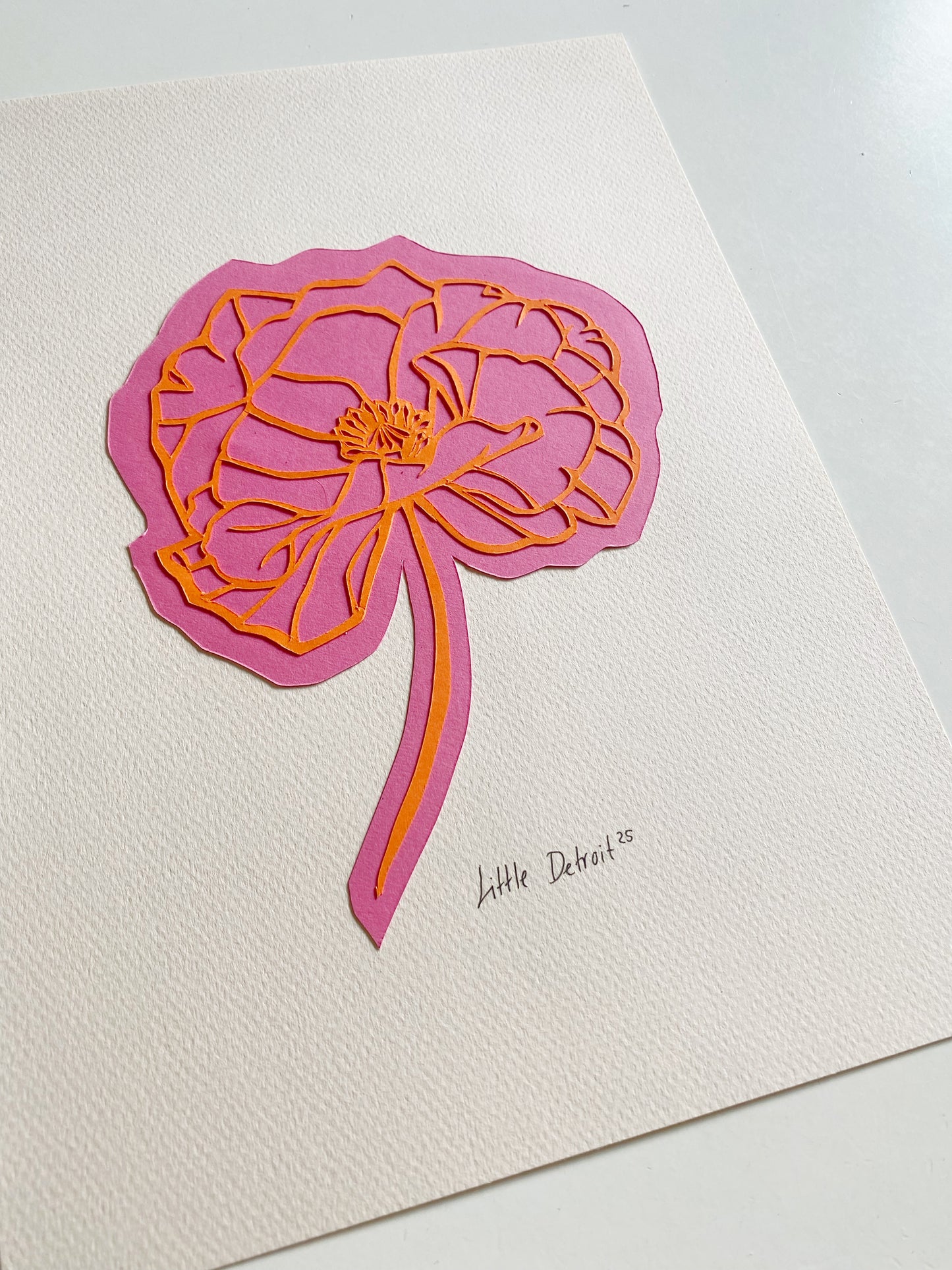 A4 papercut orangerød/lyserød/creme