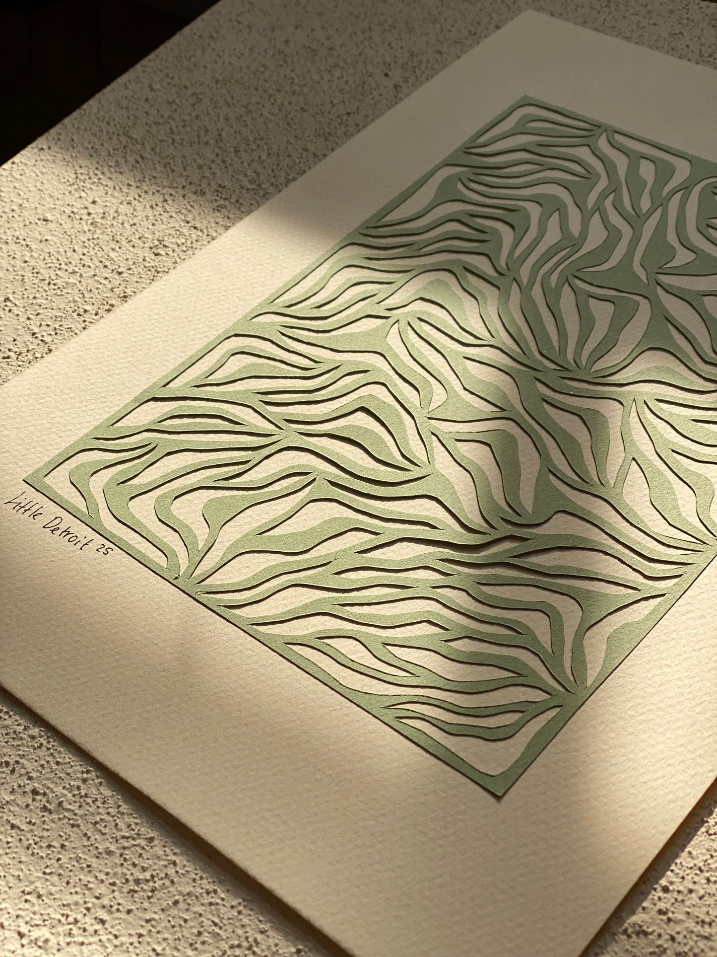 A4 papercut olivengrøn/varm creme