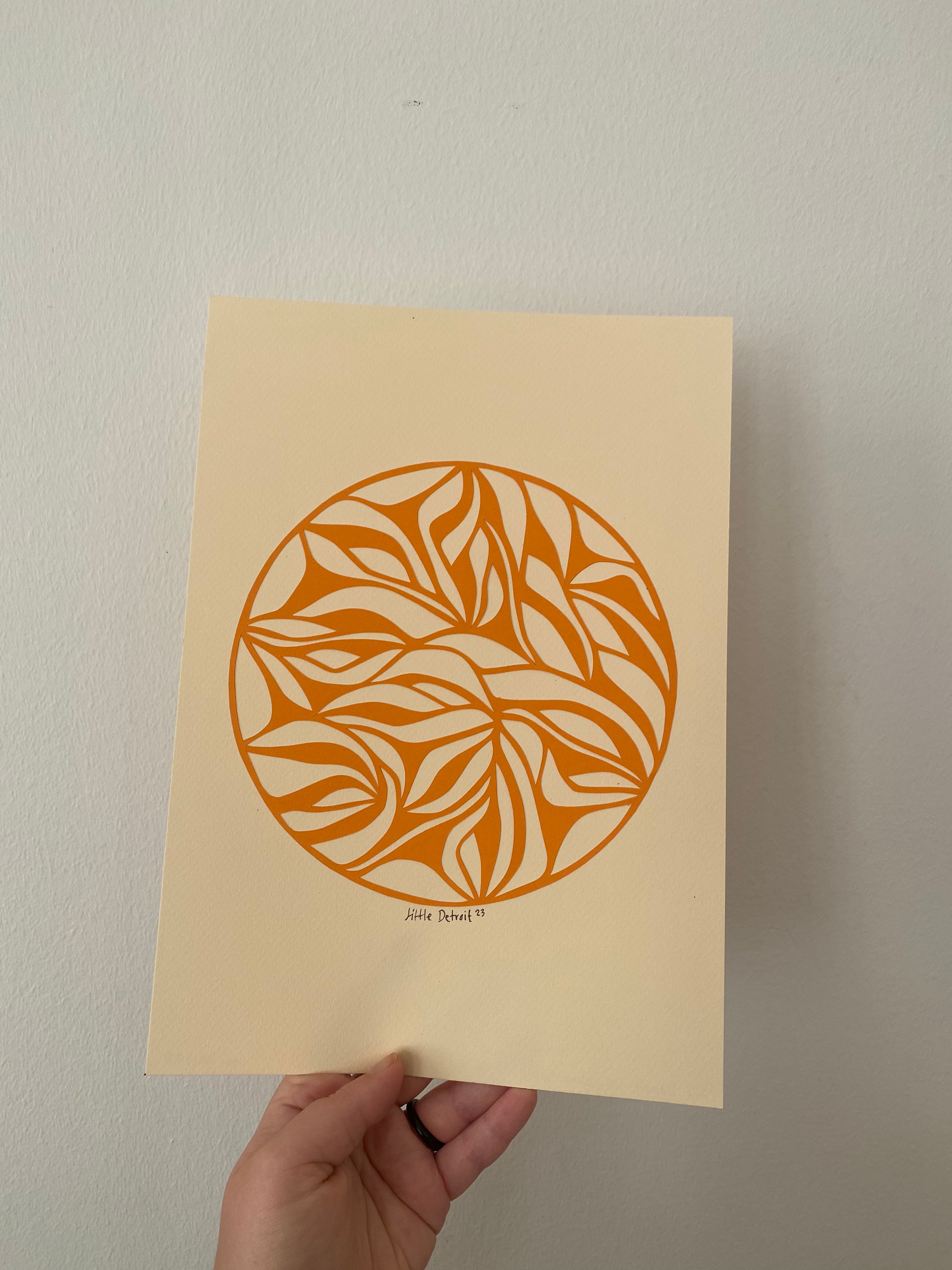 A4 papercut orange/varm creme