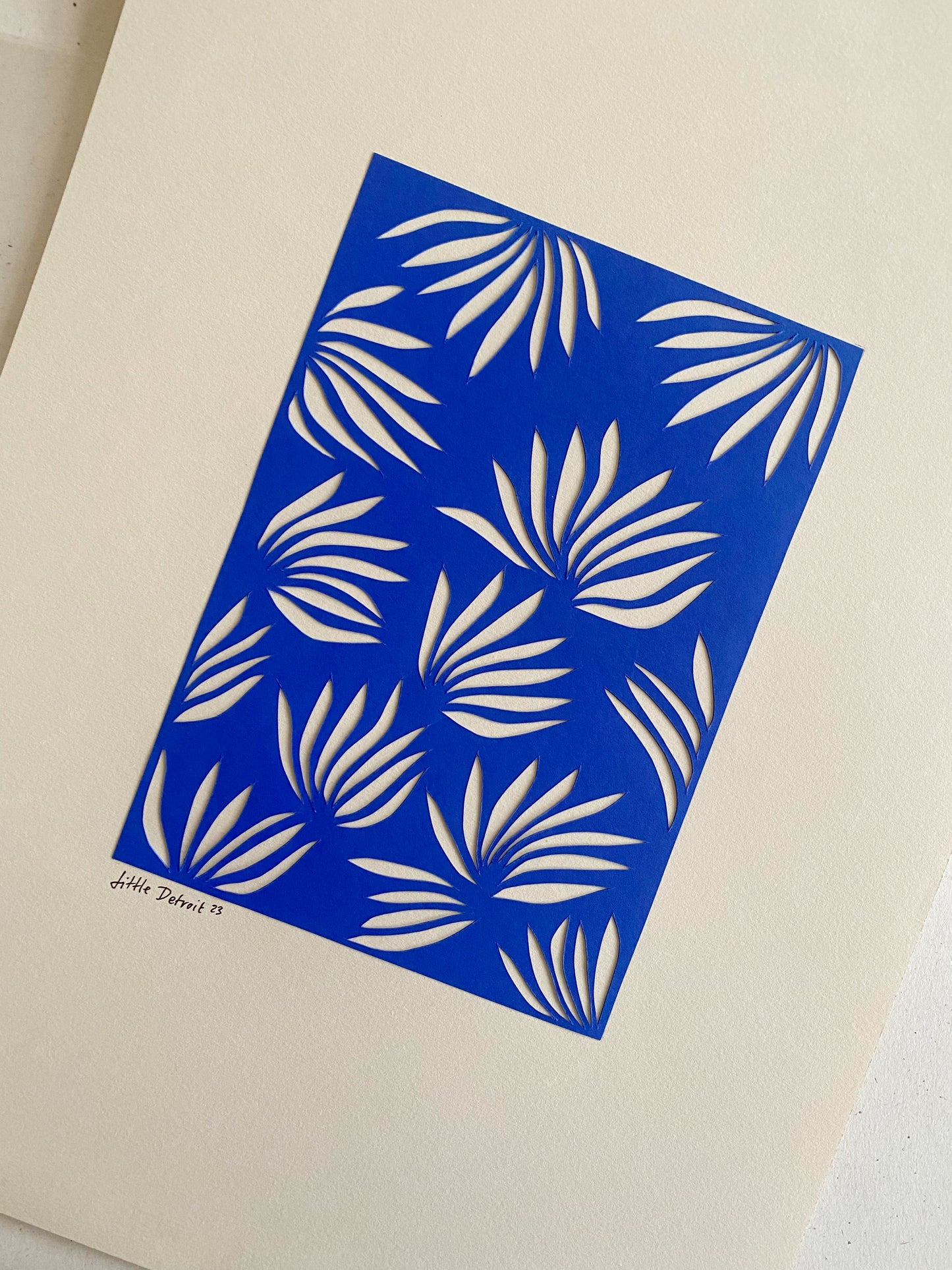 A3 papercut royal blue/cream