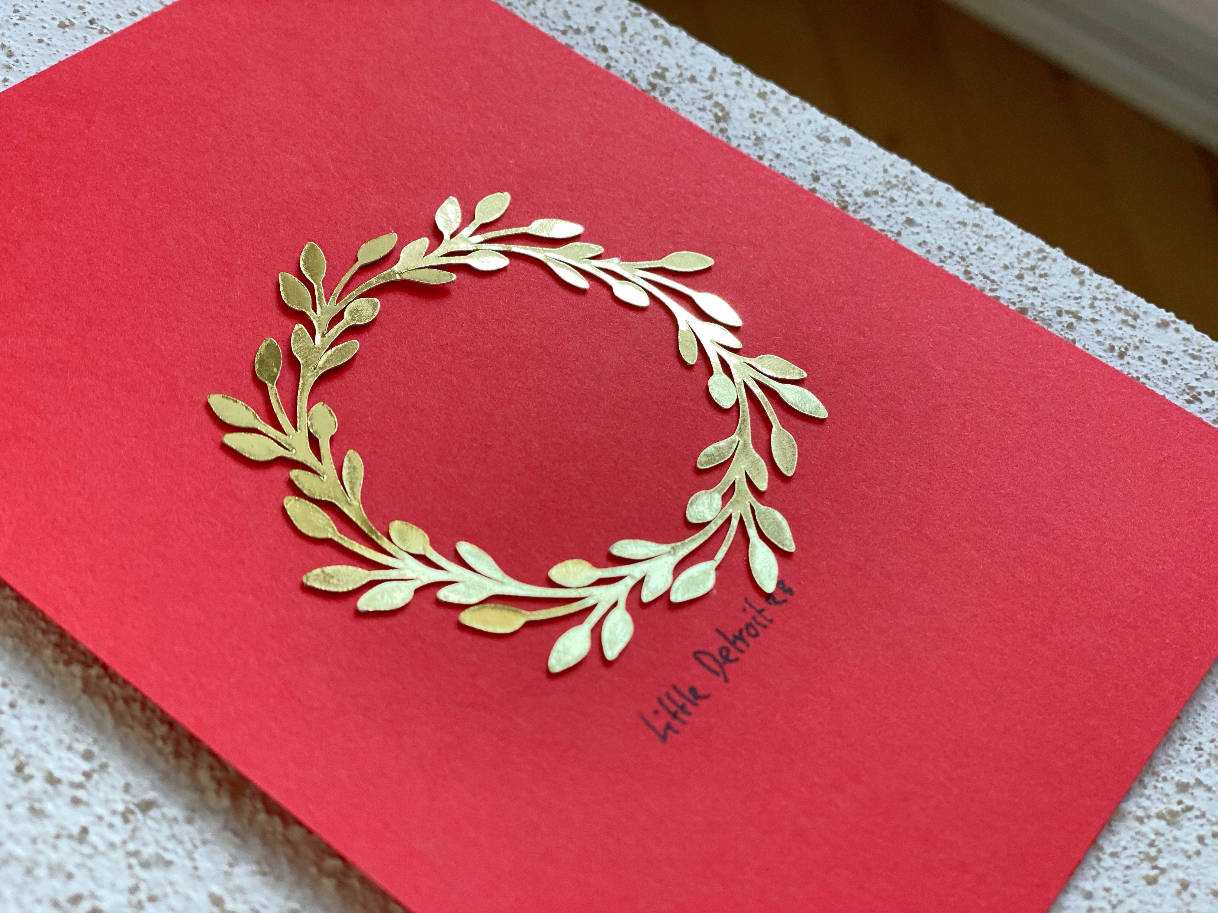 A6 julekort ‘krans’ guld/rød