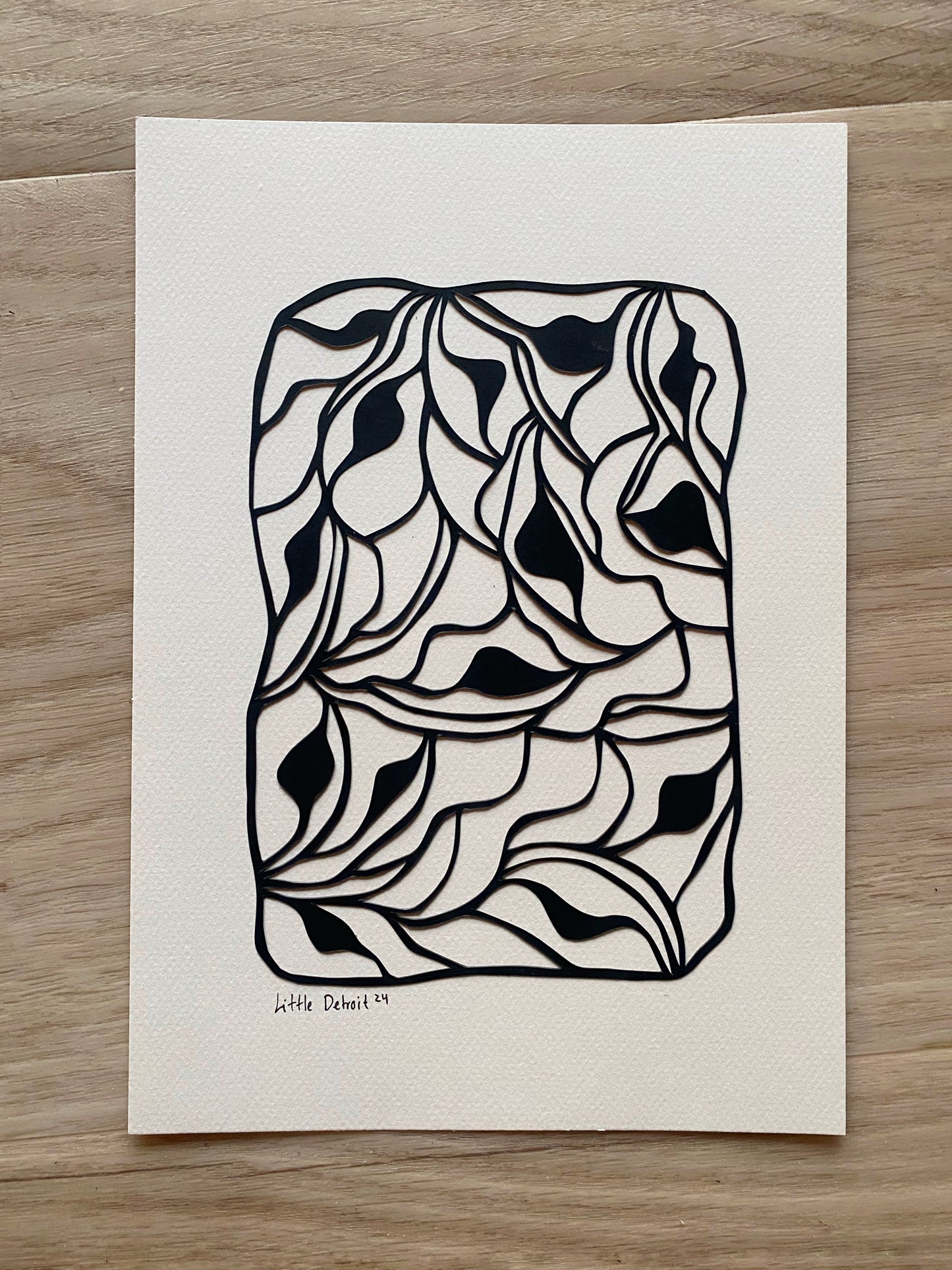 A4 papercut sort/creme